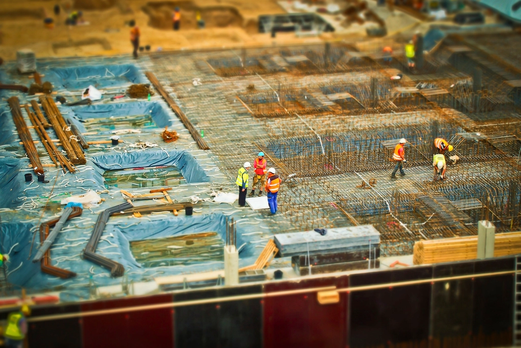 Large commercial building site with workers